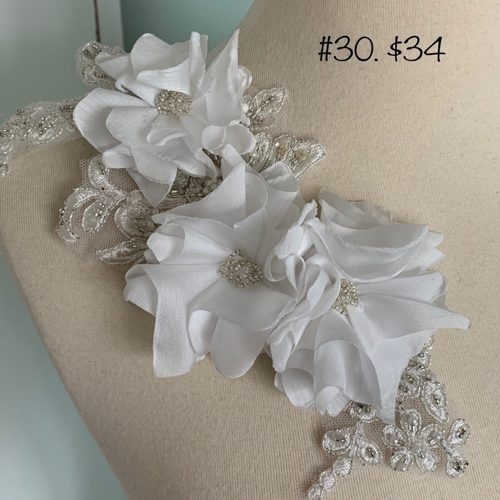 White, silver flower magnetic pin brooch